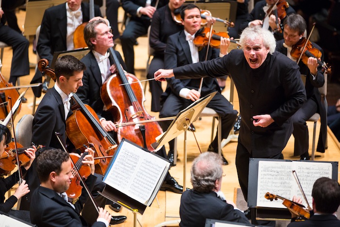 Simon Rattle conducted the Berlin Philharmonic Friday night at Symphony Hall. Photo: Robert Torres