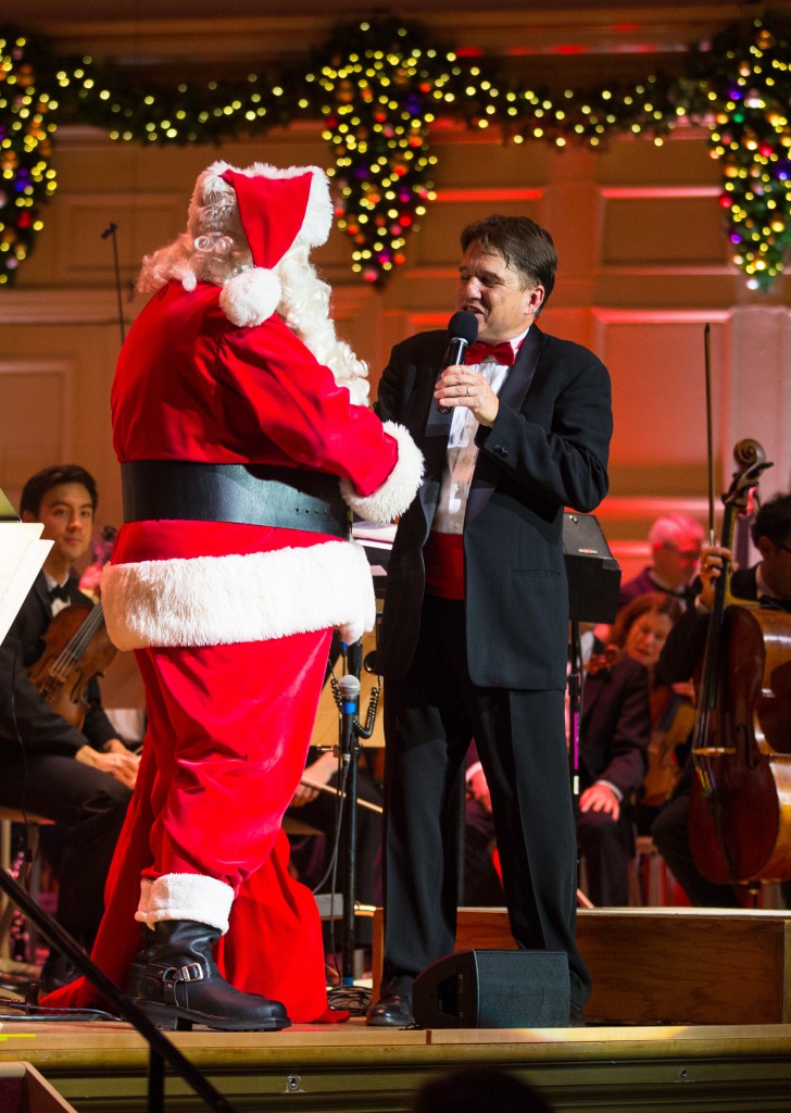 Keith Lockhart and Santa Claus at the Holiday Pops concert Tuesday night at Symphony Hall. Photo: Robert Torres