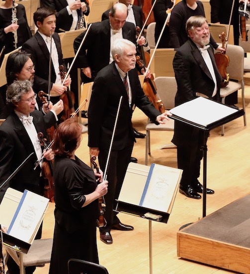 John Harbison takes a bow with Andrew Davis and the Boston Symphony Orchestra following the performance of his Symphony No. 2 Thursday night. Photo: Hilary Scott